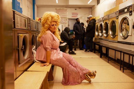 Claire Moore dressed as Dolly Parton, in Peckham Wash and Dry launderette, London, 2021.