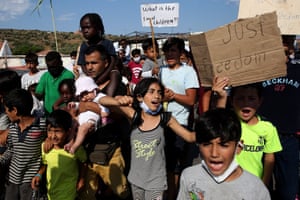 Asylum seekers protest against the new camp at Kara Tepe.