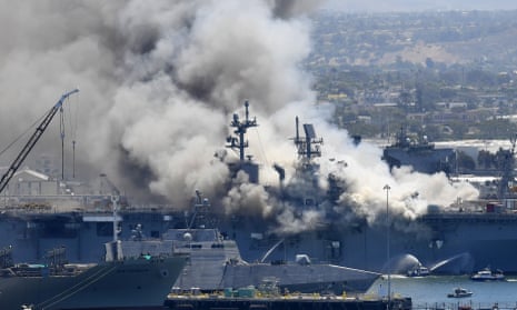 Smoke rises from the USS Bonhomme Richard at Naval Base San Diego after an explosion and fire in July 2020.