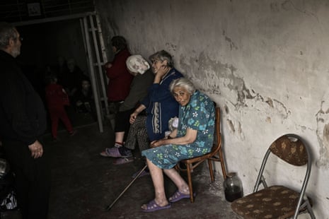 People live in a shelter to be protected from shelling in the city of Lysychansk.