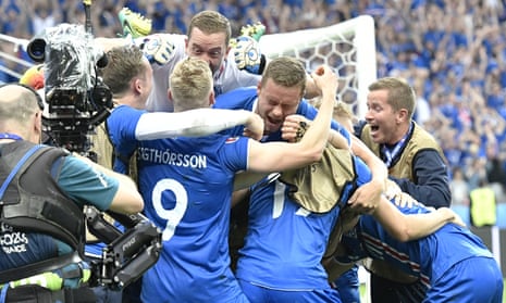 Iceland players celebrate a goal by Iceland’s Arnor Ingvi Traustason