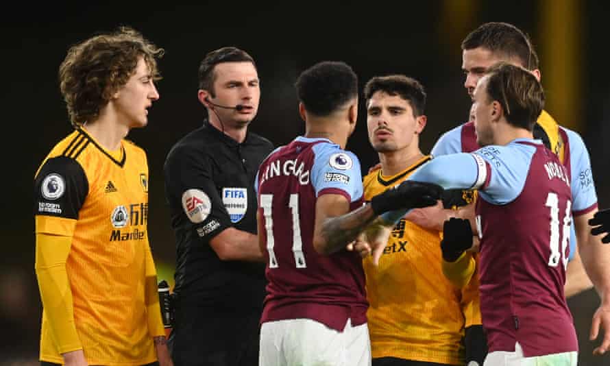 West Ham’s Jesse Lingard clashes with Wolves’ Pedro Neto after the match
