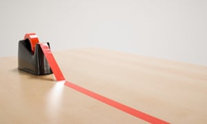 Red tape on a desk
