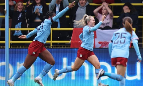 Lauren Hemp of Manchester City celebrates after scoring the team's first goal.
