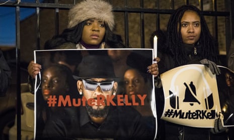 #MuteRKelly supporters protest outside R. Kelly’s studio in Chicago. 