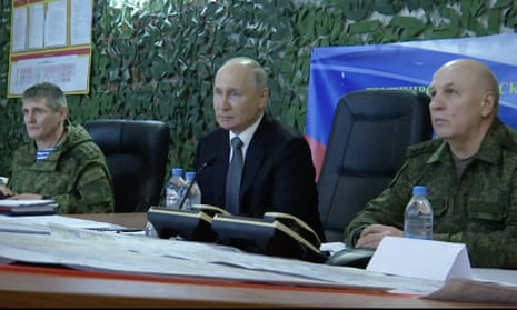 This screen grab taken from Kremlin footage shows Putin attending a meeting in the occupied Kherson region of Ukraine.