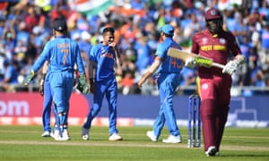 Yuzvendra Chahal of India celebrates after taking the wicket of Sheldon Cottrell of West Indies.