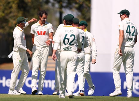 Mitchell Starc celebrates after taking the wicket of Mominul Haque