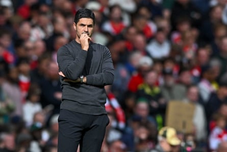 Mikel Arteta stands on the sidelines deep in thought