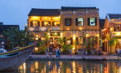 Hoi An river scene night, illuminated riverside bars and restaurants in the tourist quarter in Hoi An, Vietnam.