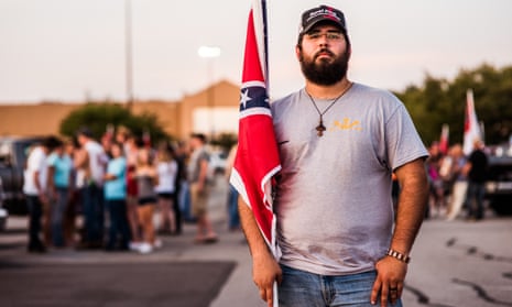 Mathew Heimbach, poses for portrait at a confederate flag rally that ended in a parking lot in Knoxville, Tennessee. Theresa May has excluded more foreign nationals for unacceptable behaviour than any other home secretary, a spokesman said.