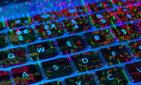 Stock photo of black keyboard overlaid with green and red images and light.s