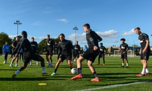 Jeff Hendrick (centre in light boots) trains with his new teammates.
