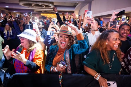 Supporters cheer at a Warnock election night party in Atlanta.