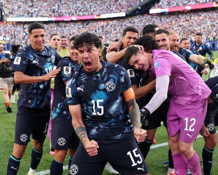 Gustavo Gomez leads the Paraguayan celebrations after their dramatic shootout win over Germany.