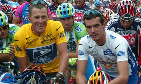 Lance Armstrong (left) of theUS Postal team and his Cofidis rival David Millar wait for the start of the first stage of the 2002 Tour de France in Luxembourg.
