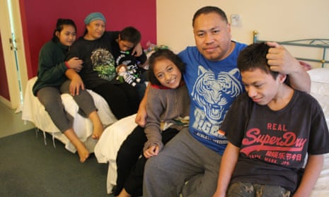 Emily Saitu and her family inside their motel room in South Auckland.