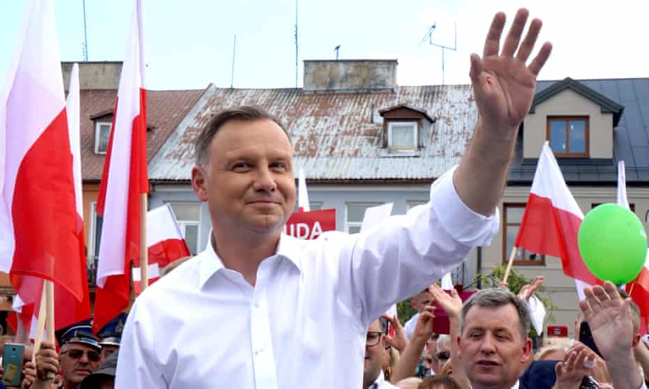 Andrzej Duda greets supporters during a campaign meeting ahead of the presidential election in Plonsk, central Poland, on 16 June 2020.