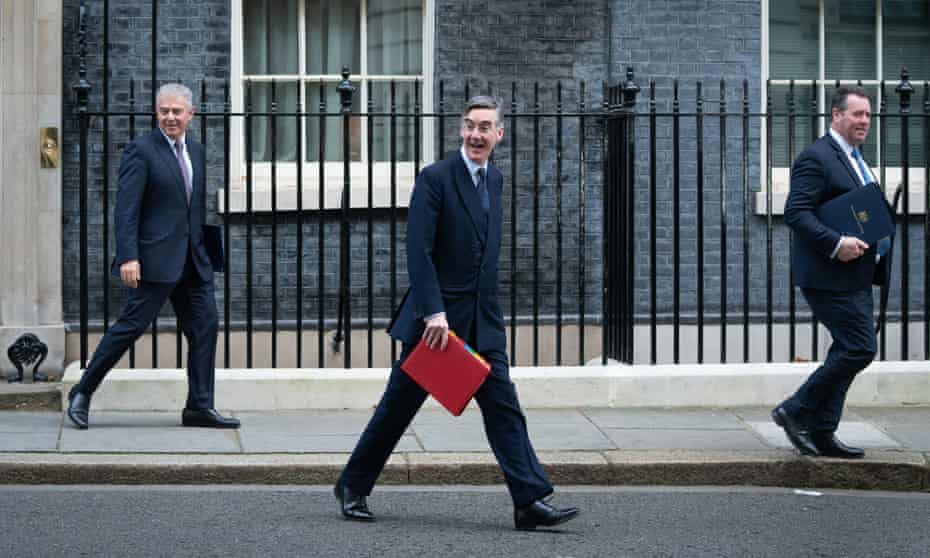 Jacob Rees-Mogg (centre), Northern Ireland secretary Brandon Lewis (left) and chief whip, Mark Spencer, outside No 10 on Tuesday.