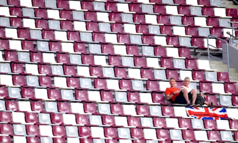 Supporters in the stands at The Khalifa International Stadium.
