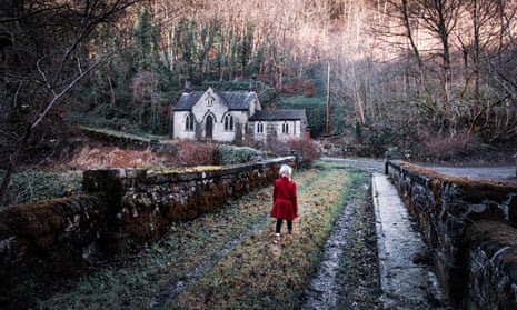 A little girl walking towards an old scary, spooky abandoned house, church in the woods, located in the Derbyshire Peak District National Park, hallow<br>2A6G93K A little girl walking towards an old scary, spooky abandoned house, church in the woods, located in the Derbyshire Peak District National Park, hallow