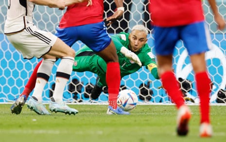 Costa Rica's Keylor Navas pounces on the ball.