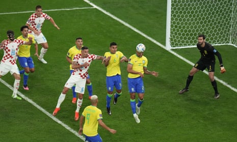 Brazil's Danilo heads the ball