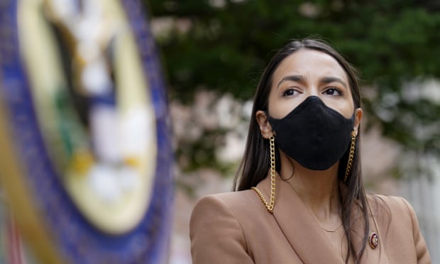 Alexandria Ocasio-Cortez in August. Donald Trump was impeached for inciting the Capitol attack and will face trial in the Senate.