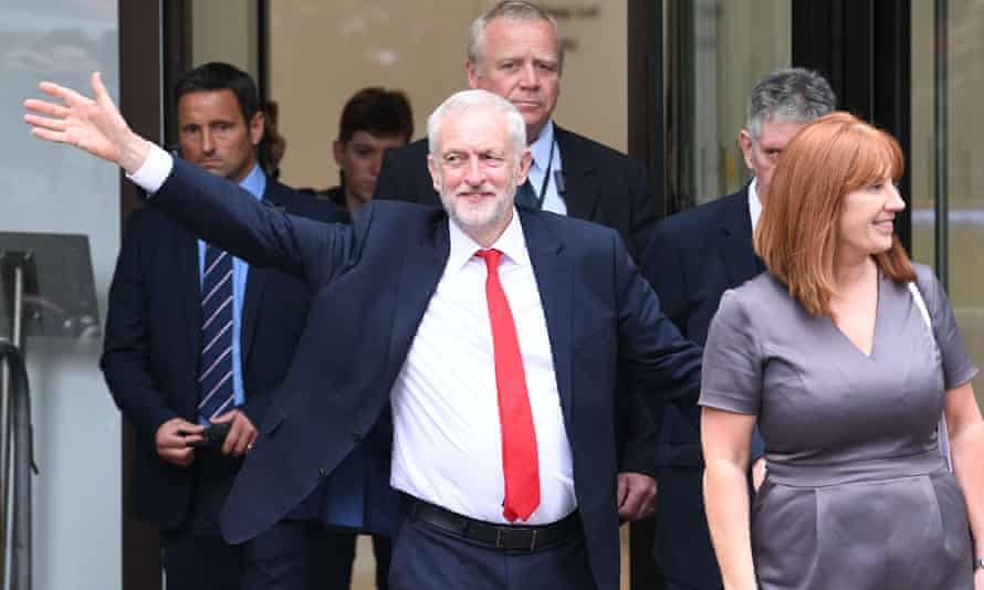 Jeremy Corbyn leaves Labour Party HQ in central London after he reiterated his call for Theresa May to resign as Prime Minister