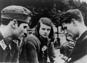 A picture taken on 23 July 1942 shows German resistance fighter Sophie Scholl, centre, with her brother Hans Scholl, left, and Christoph Probst.