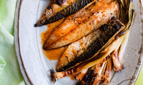 ‘I sometimes struggle to get mackerel off the bars of the griddle, so decide to cook it under the oven grill’: grilled mackerel with lemon and spring onions.