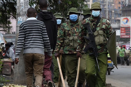 Heavily armed police officers patrol in Eastleigh, Nairobi, in May.