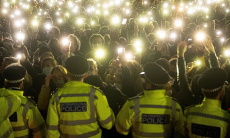 Police at a vigil for Sarah Everard on Clapham Common, London, in March.