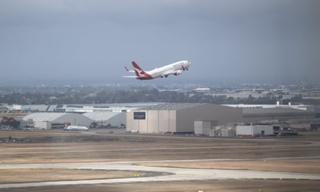 A Qantas plane taking off at Melbourne airport