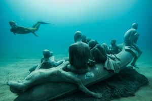 The submerged refugee boat sculpture off Lanzarote.