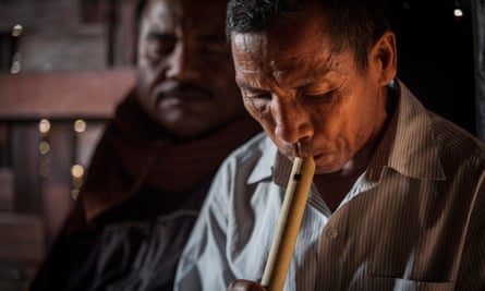 A member of the Biate hill tribe plays a theile, a flute hand-carved out of local wood.