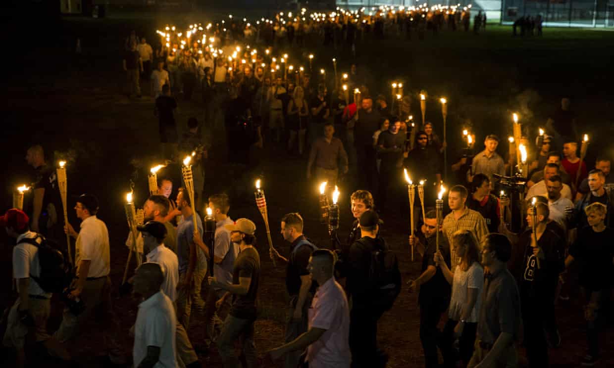 Far-right activists marched through the University of Virginia campus with torches on Friday night.