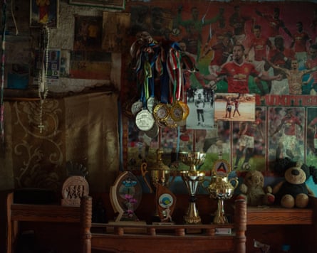 Despite the limited space in his house, Diry reserves a special place for his athletics trophies.