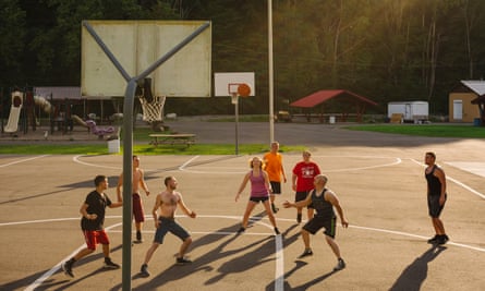 Young people play basketball on a summer afternoon in Webster Springs, West Virginia.