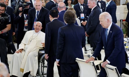 The Japanese prime minister, Fumio Kishida, and Argentinian president, Javier Milei, line up to greet Pope Francis as the US president, Joe Biden, looks on.