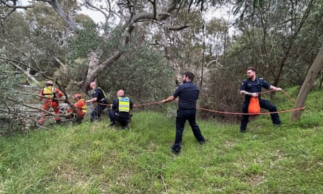 Emergency workers rescue a 29-year-old woman found clutching a tree in the Werribee River
