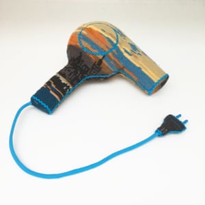 A hair dryer by Swedish designer Ulla-Stina Wikander, who covers 1970s household objects in second-hand cross-stitches