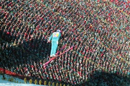 Eddie Edwards soars above the slope as he makes his second jump of the day during the 90m ski jump competition at the 1988 Calgary Winter Olympics