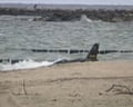 Wreckage of a suspected Russian drone lies in shallow water off a Baltic Sea beach