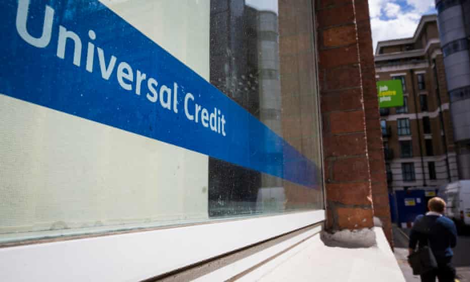 A Universal Credit sign in the window of the Job Centre in Westminster, London. Photo by Jack Taylor/Getty Images