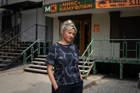 Sokolova, by her ground-floor shop.