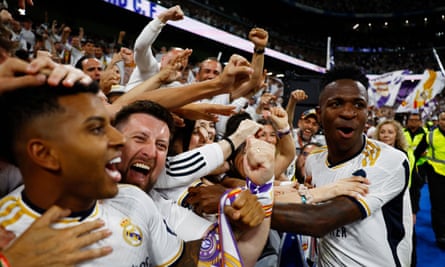 Vinícius Júnior celebrates with Real Madrid’s fans after Jude Bellingham’s winner