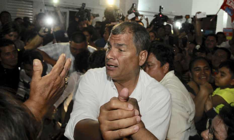 Rafael Correa greets his supporters in Guayaquil, Ecuador Monday.