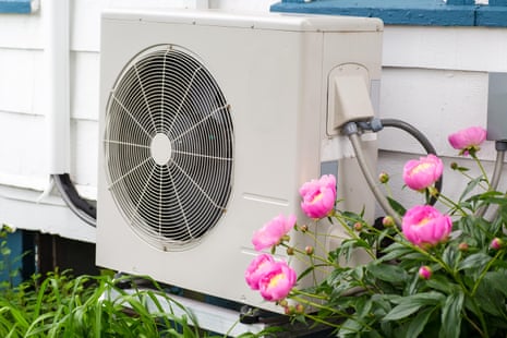 Stock photo of air conditioning/heat pump unit on the side of a house