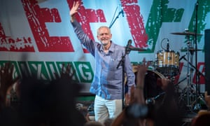 Jeremy Corbyn on stage at Glastonbury last month.